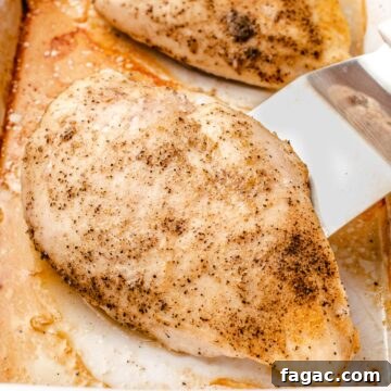 Juicy Oven-Baked Chicken Breasts with Garlic and Herbs 9 Baked chicken breast in a pan.