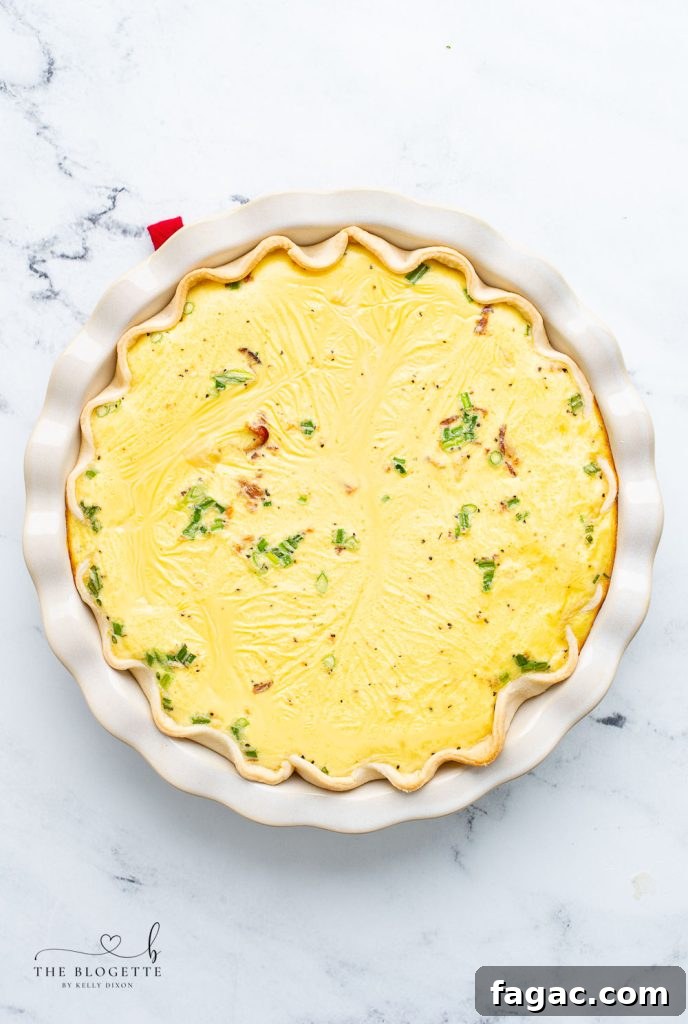 Baked eggs and potatoes in a pie dish