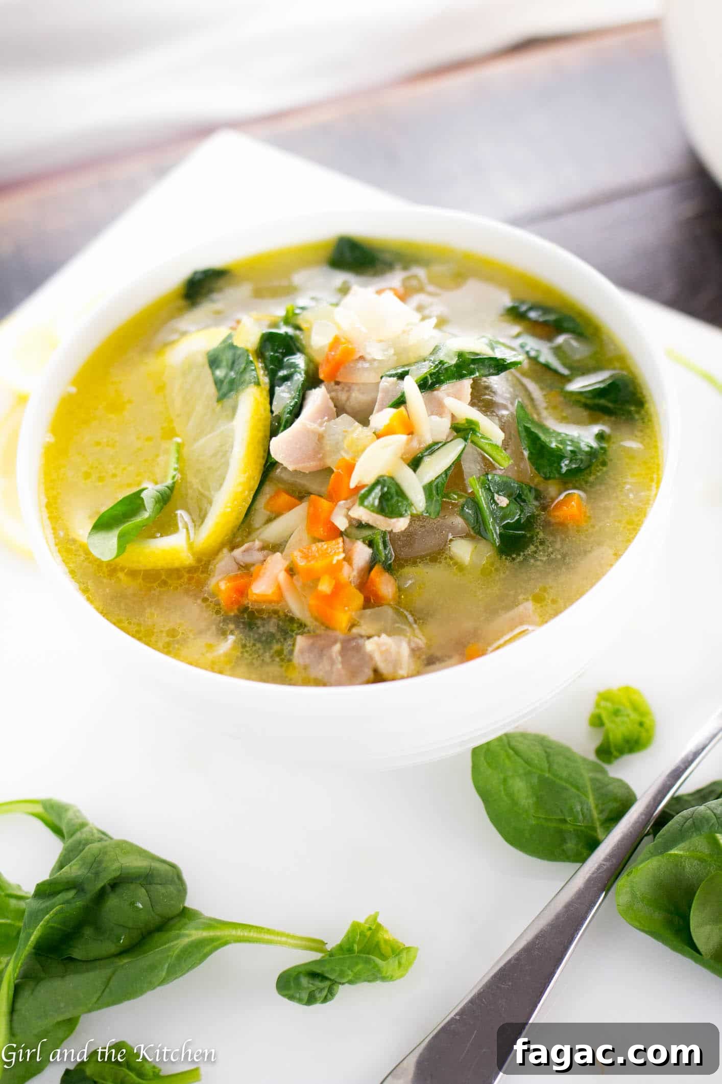 A perfect take on the popular Panera Lemon Chicken Orzo soup! A healthy and fresh soup bursting with bright lemony flavors and tender orzo pasta!