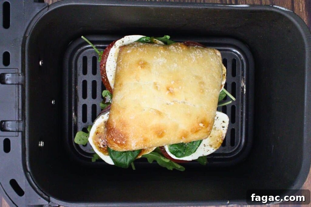 place caprese sandwich in air fryer basket