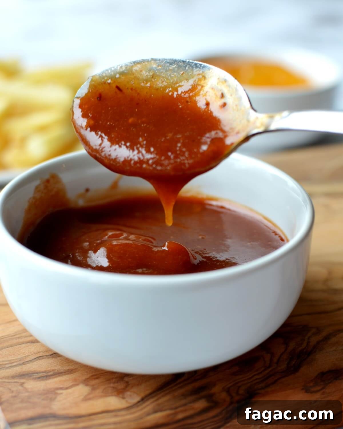 4-Ingredient Peach BBQ Sauce Recipe for Grilling 2 A spoonful of peach bbq sauce