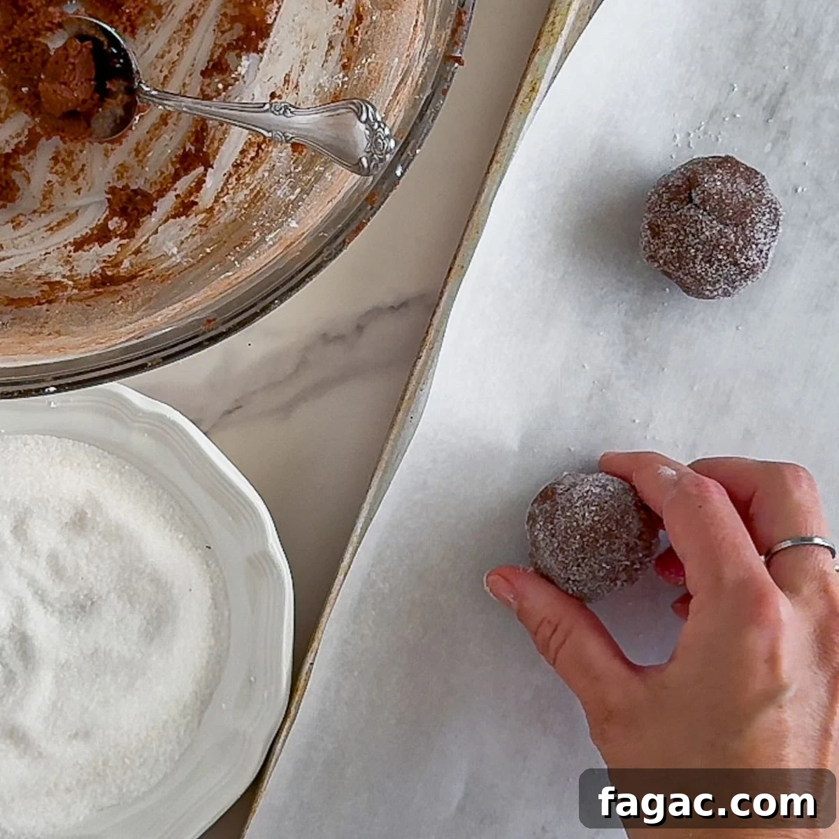 Ultimate Chewy Chocolate Cookie Recipe for Perfect Texture 7 Adding dough balls to a parchment paper lined baking sheet.