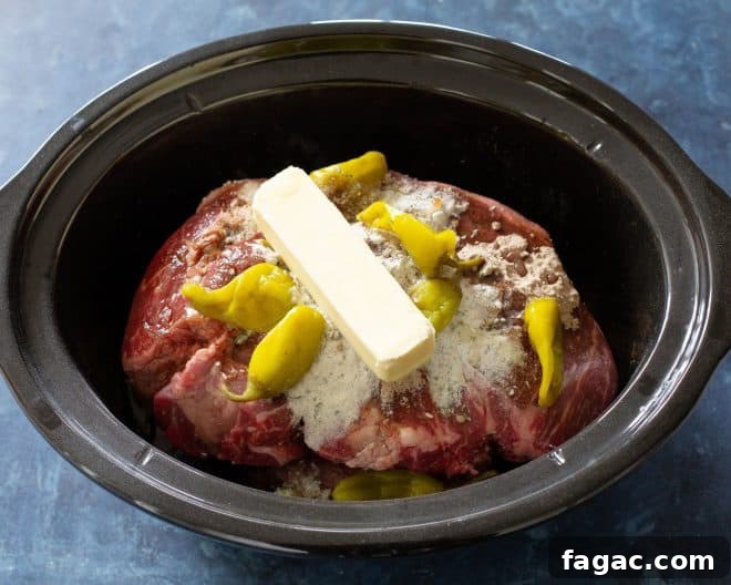Classic Mississippi Pot Roast Recipe: Tender Slow-Cooker Comfort Food 3 roast with butter on top