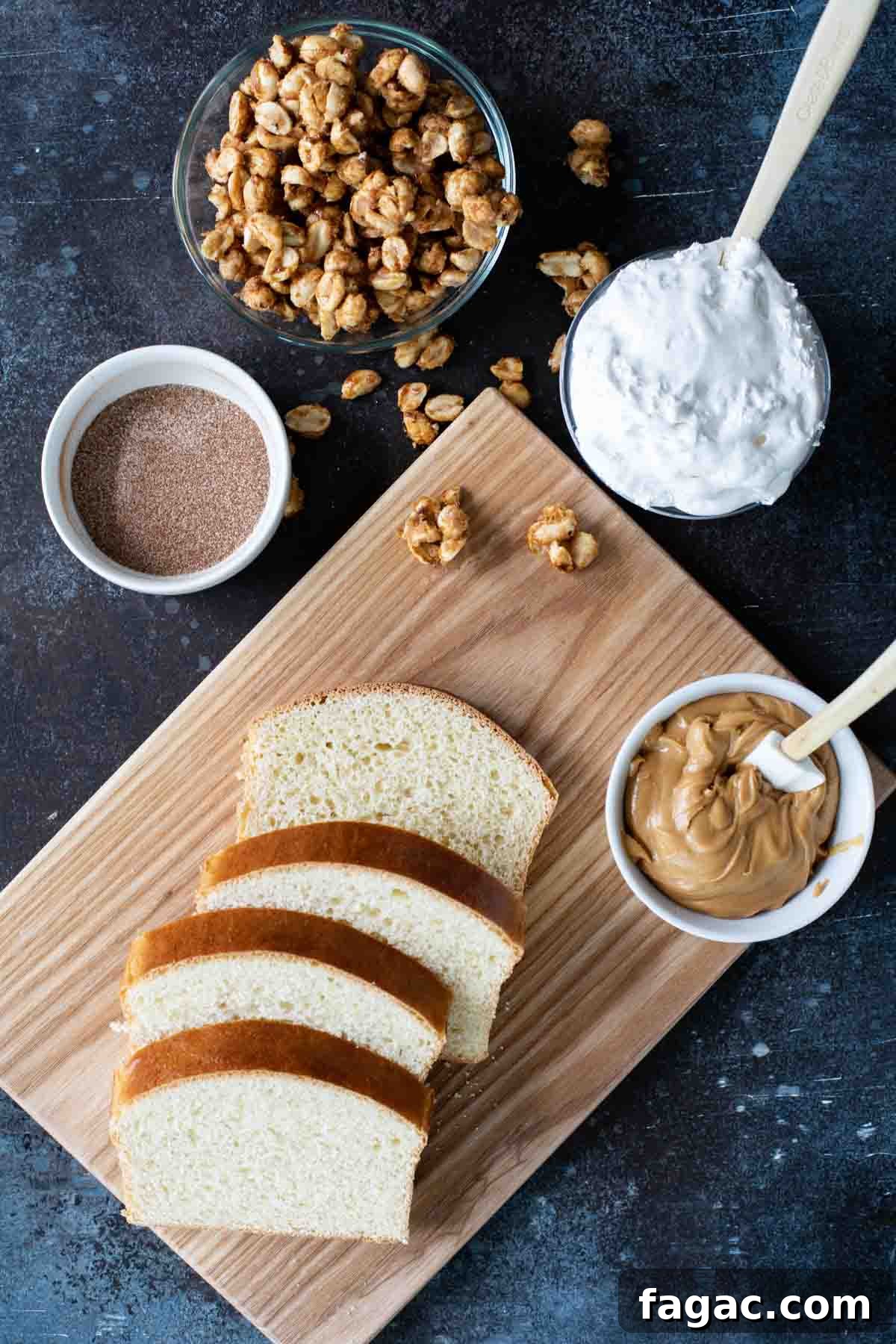 A version of a New England classic, this Fluffernutter Panini has melted marshmallow creme, peanut butter and candied peanuts all toasted on cinnamon sugar crusted bread. Ingredients to make a Fluffernutter Panini.