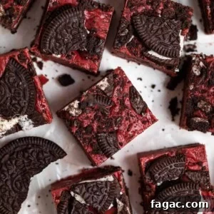 Decadent Red Velvet Oreo Fudge Recipe for Dessert Lovers 10 Overhead view of red velvet Oreo fudge with Oreos surrounding.