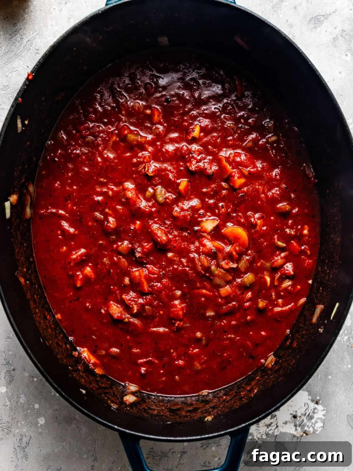 braising liquid in a large pot.