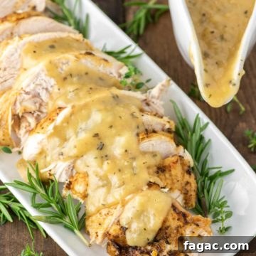 Juicy Instant Pot Turkey Breast Recipe for Quick Weeknight Dinners 10 sliced instant pot turkey with gravy on white plate