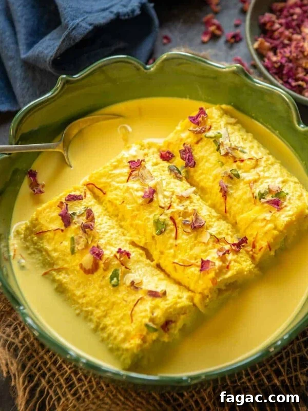 Bread Malai Roll is an Indian sweet where white bread slices are stuffed with a thick rabdi and then dunked in flavourful reduced milk.