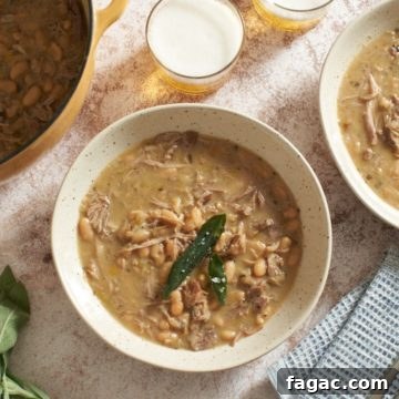 Braised Pork with White Beans, Wine & Fresh Sage 11 A Dutch oven and two bowls of pork stew, two glasses of beer, some fresh sage, and a blue napkin.