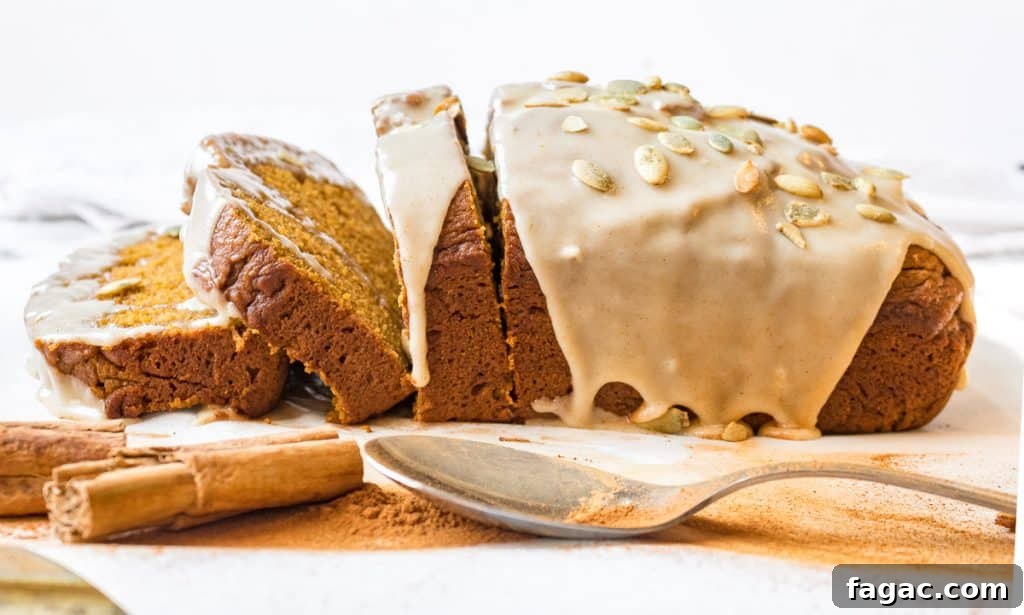 Maple Brown Butter Glazed Pumpkin Bread with Sour Cream 4 moist pumpkin bread seen from the side