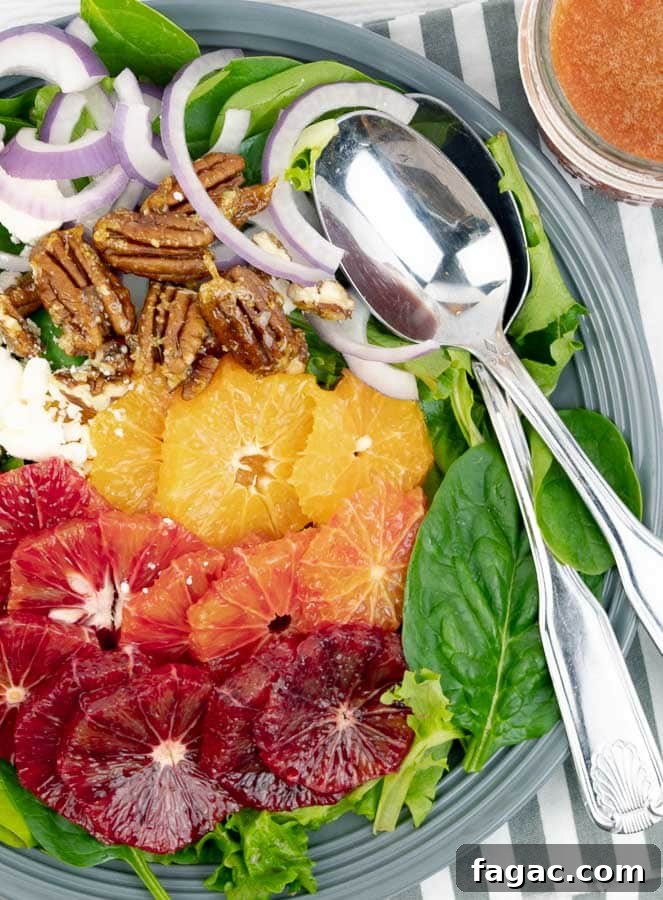 Blood Orange Salad with Tangy Orange Vinaigrette 2 Blood Orange Citrus Salad with Orange Vinaigrette on a gray plate