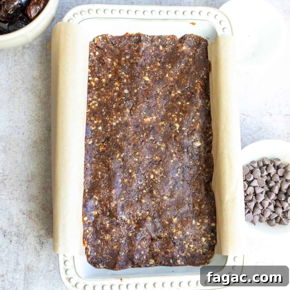 Dates pressed into a bread tin to make chewy blondies.