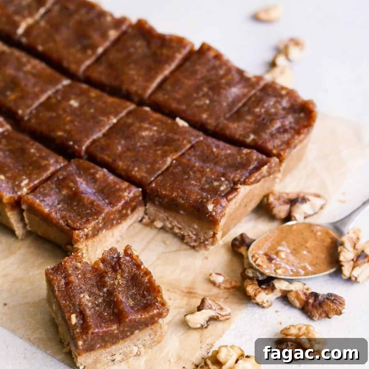 No bake Blondies on a parchment paper with walnuts.
