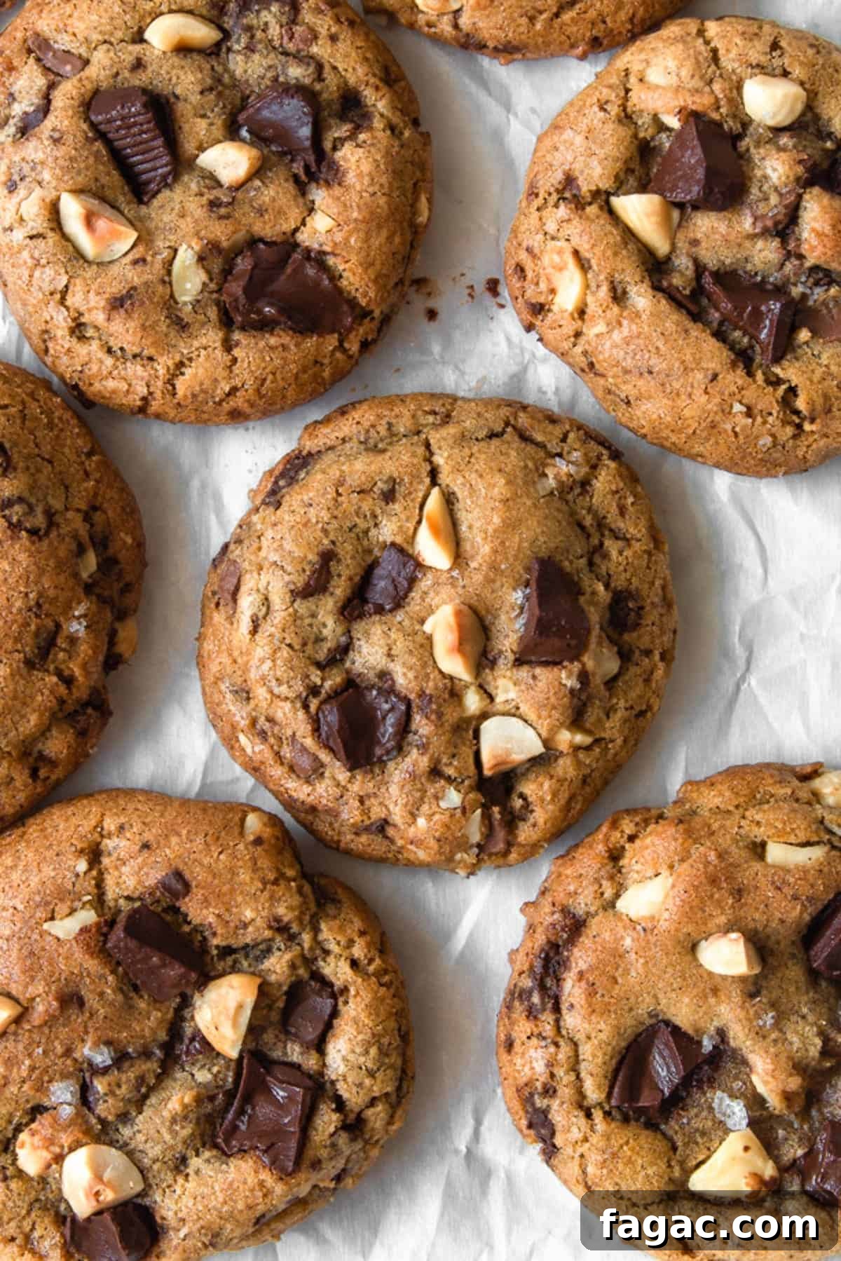 Overhead shot of browned butter chocolate chip cookies on parchment paper.