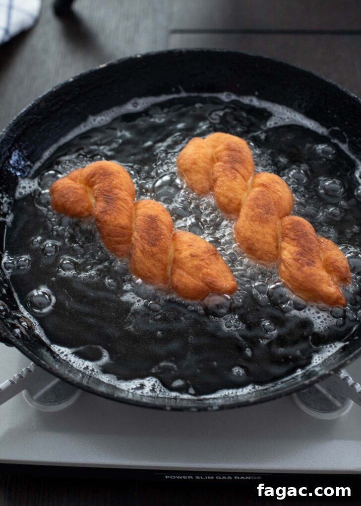 Korean Kkwabaegi Twisted Donuts Recipe: Soft Cinnamon Treats 10 Golden brown kkwabaegi donuts just fried until crisp and airy