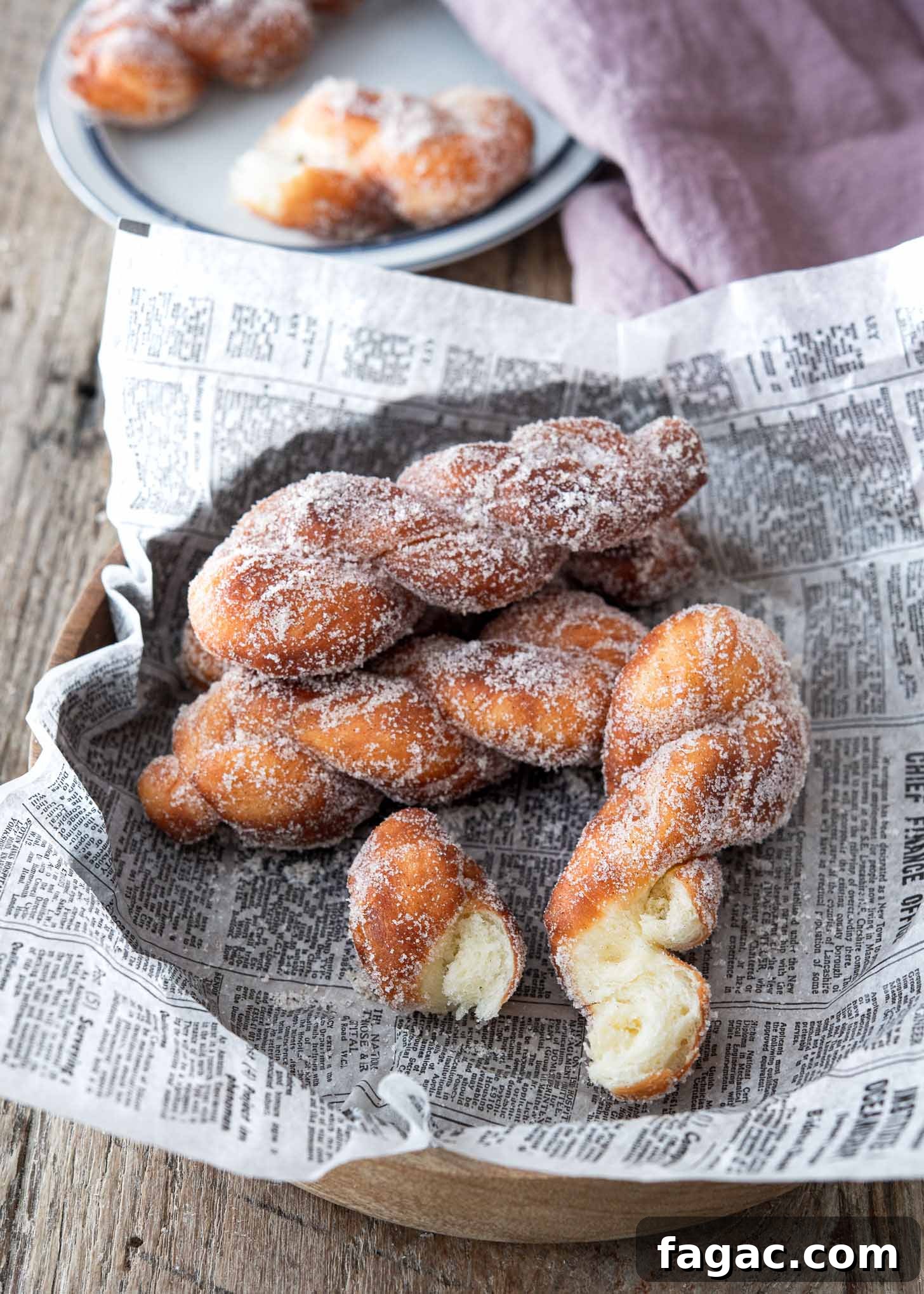 Korean Kkwabaegi Twisted Donuts Recipe: Soft Cinnamon Treats 3 Inside view of a twisted donut showing its soft, fluffy texture