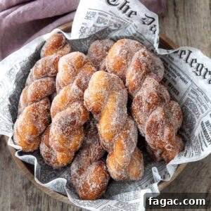 Korean Kkwabaegi Twisted Donuts Recipe: Soft Cinnamon Treats 12 Korean style twisted donuts (kkwabaegi) in a bowl.