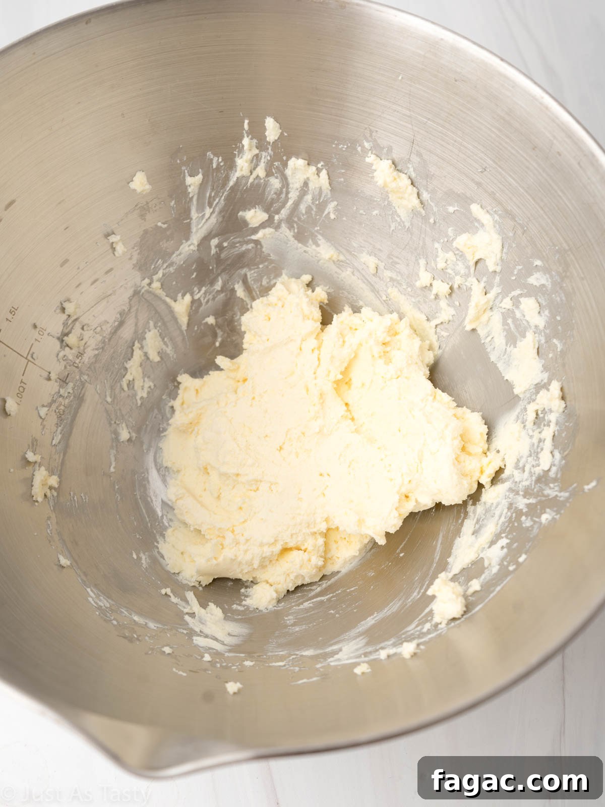 Gluten-Free Red Velvet Cake Recipe — Moist, Classic Flavor 9 Cream cheese and butter in a mixing bowl.