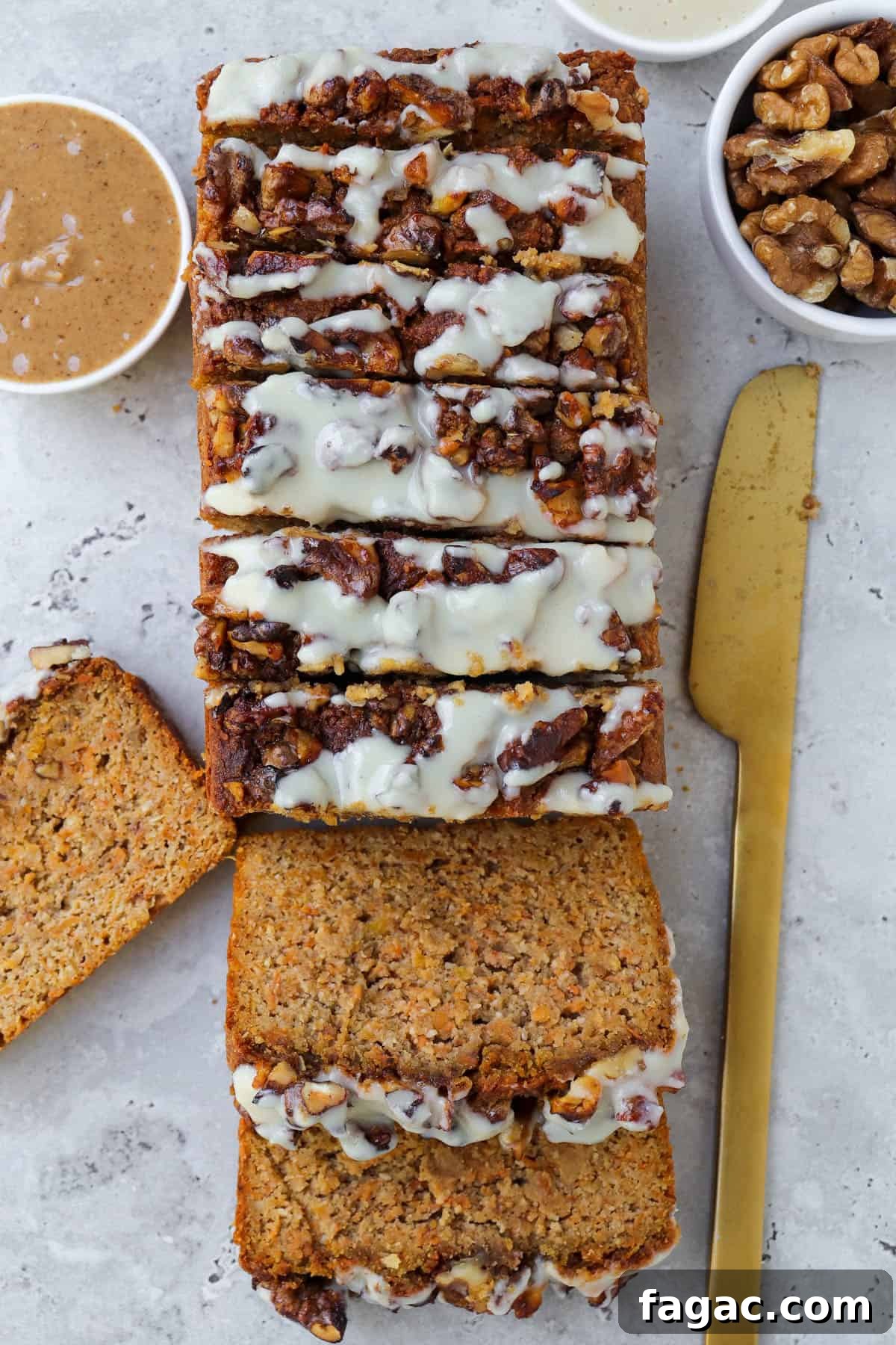 Gluten-Free Sweet Potato Spice Loaf Recipe for Fall Baking 6 Top view of sliced up loaf. Gold knife, walnuts and almond butter on sides.