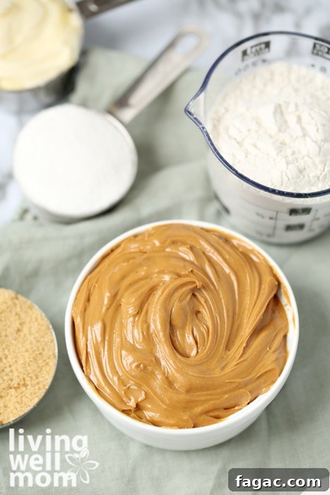 Chewy Gluten-Free Peanut Butter Cookies Recipe 5 cookie recipe ingredients including sugars, peanut butter, and flour.