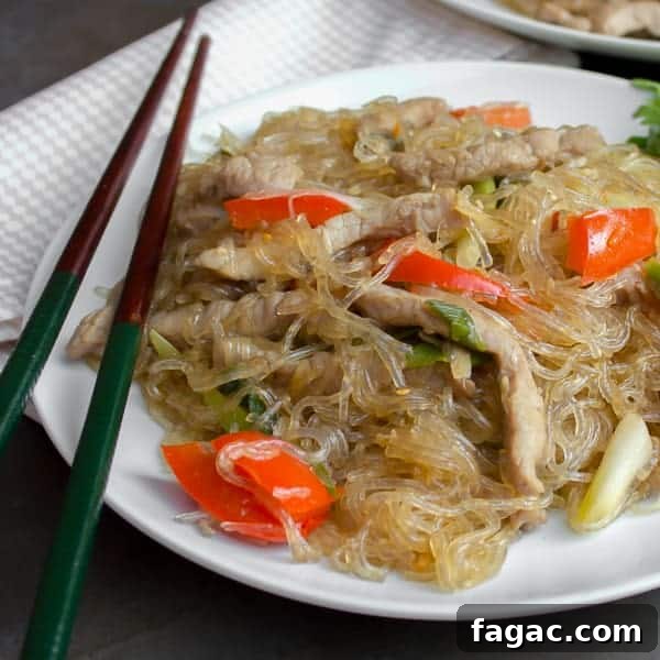Stir-Fried Glass Noodles with Pork and Vegetables 3 A Thai inspired dish with pork, red peppers and green onions/scallions and glass noodles. Also known as crystal noodles, cellophane noodles or Chinese noodles, these are made with bean or peas.