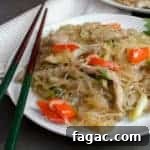 Stir-Fried Glass Noodles with Pork and Vegetables 4 A Thai inspired dish with pork, red peppers and green onions/scallions and glass noodles. Also known as crystal noodles, cellophane noodles or Chinese noodles, these are made with bean or peas.