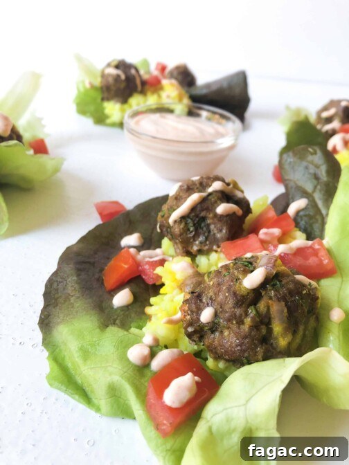Moroccan Kofta Lettuce Wraps with a spicy yogurt sauce