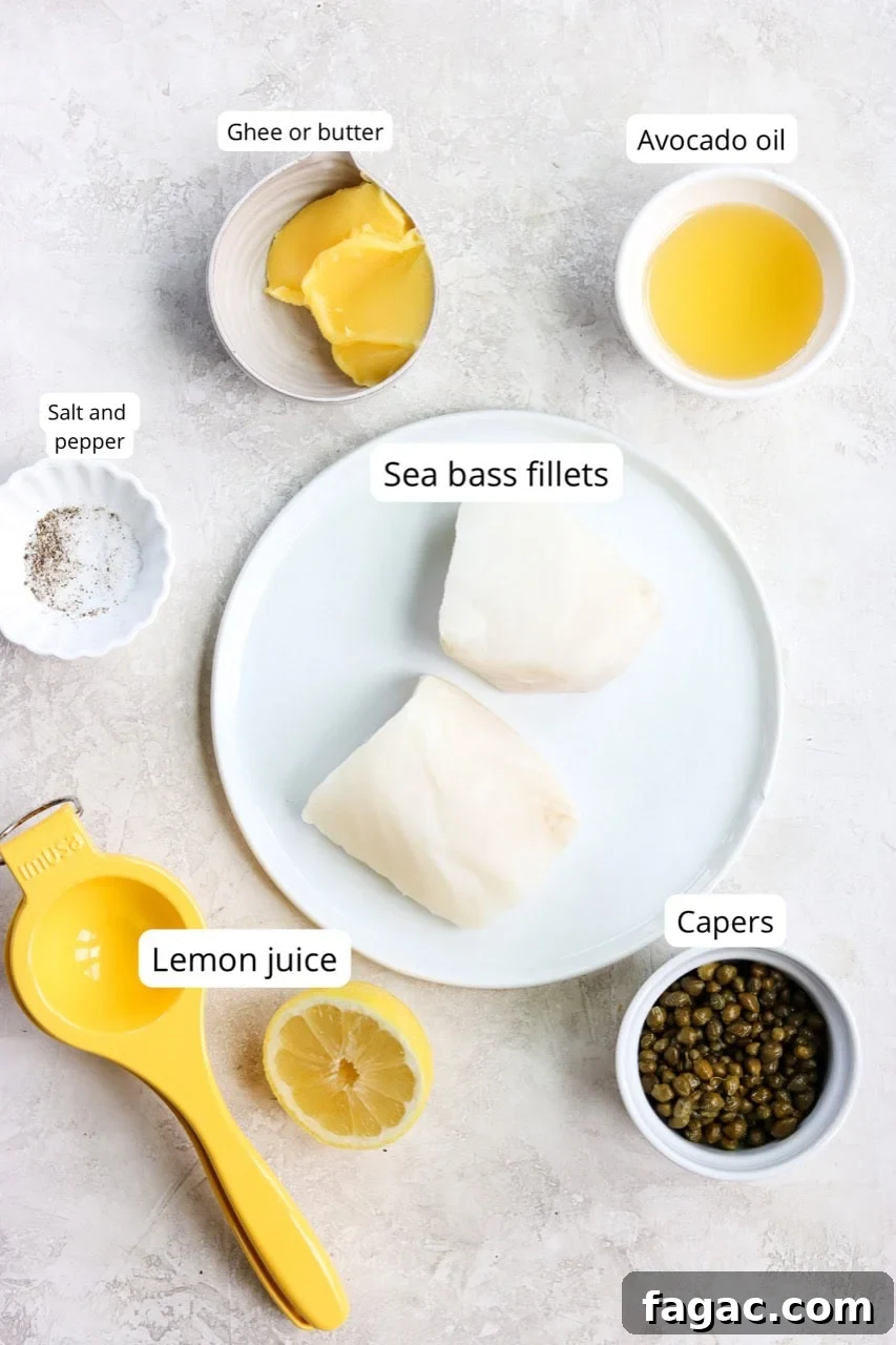 chilean sea bass fillets on a white plate surrounded by other ingredients: capers, lemons, seasonings, butter, and oil.