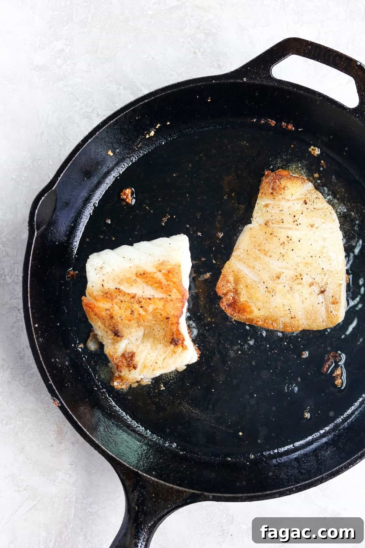 pan seared chilean sea bass finished in a cast iron pan