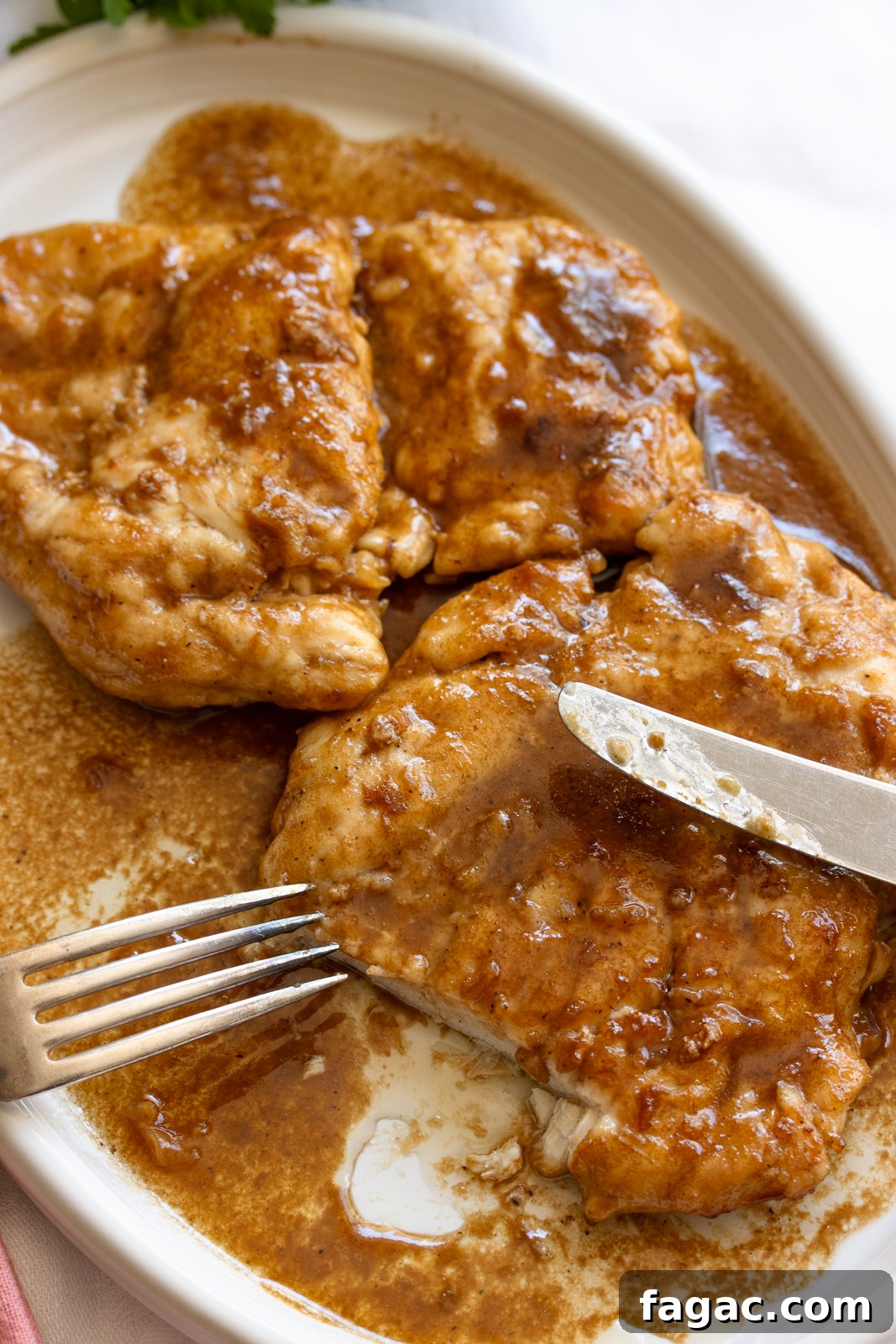 chicken marsala on a white serving plate