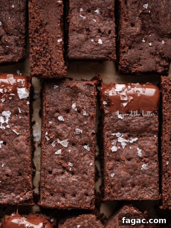 Sliced homemade chocolate shortbread sprinkled with flaky sea salt