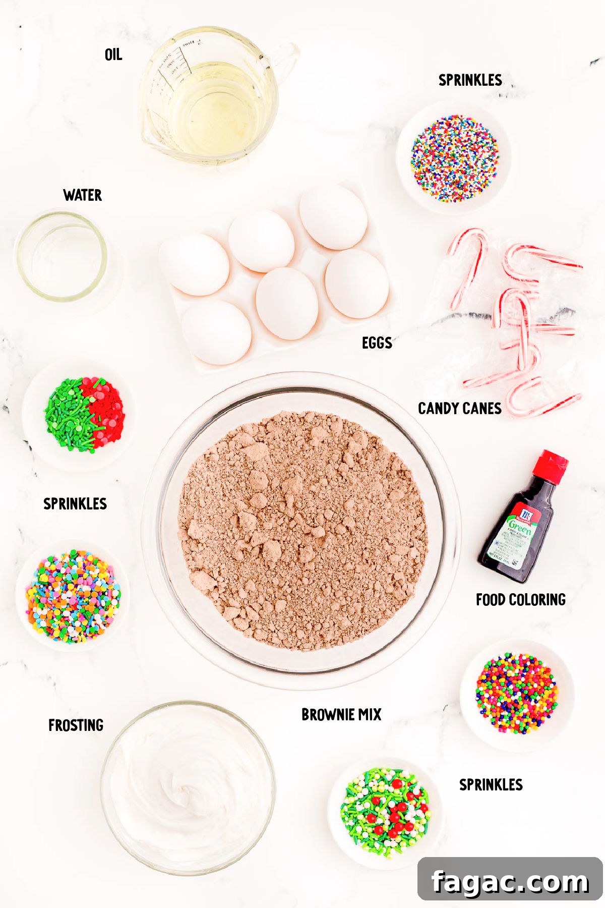 Overhead photo of ingredients for brownie Christmas trees prepped on a marble surface.