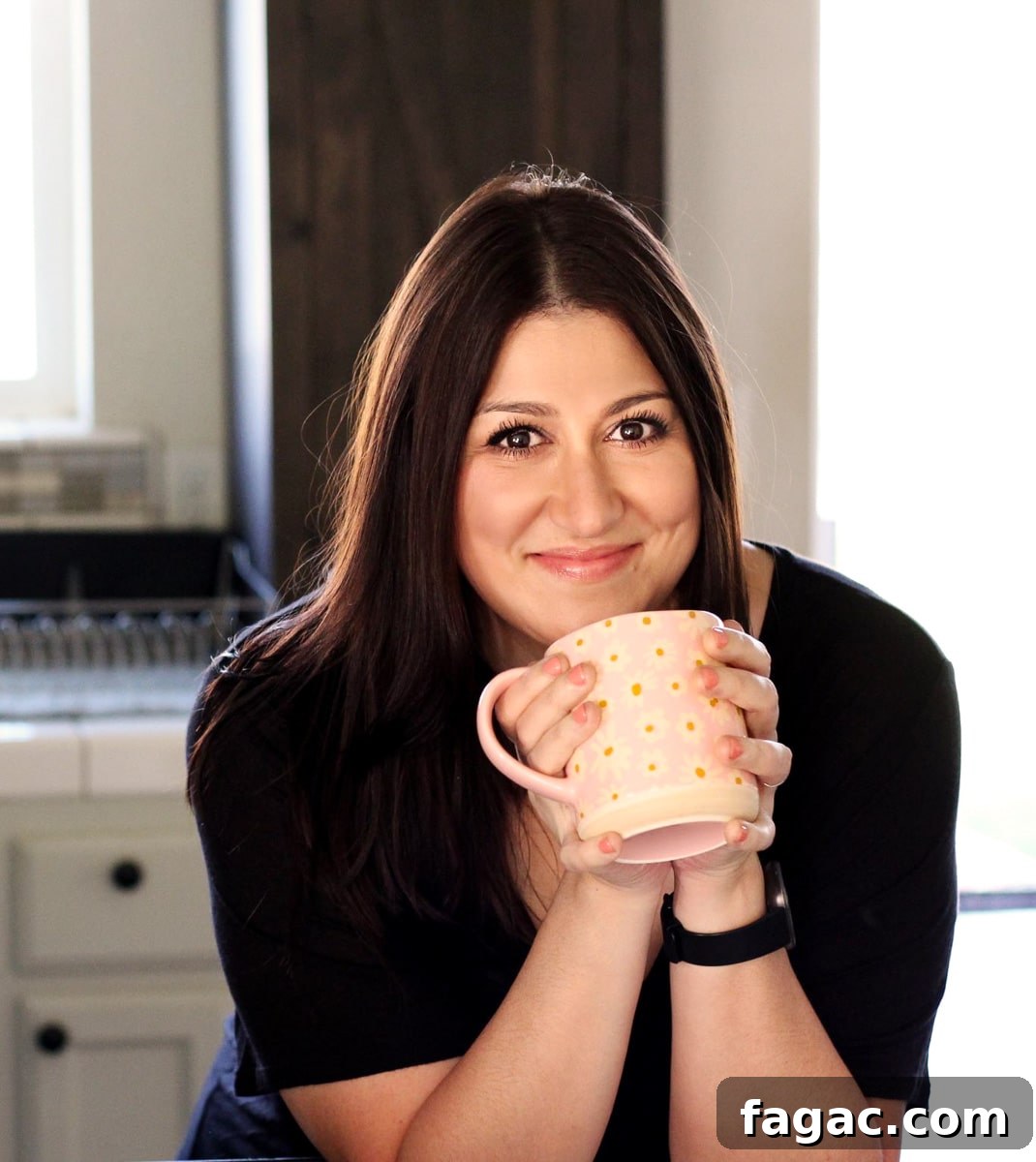 Creamy Beef Taco Soup Recipe with Cheesy Tortilla Toppings 12 Picture of Priscilla Lawrence owner of Sprinkled with Balance.