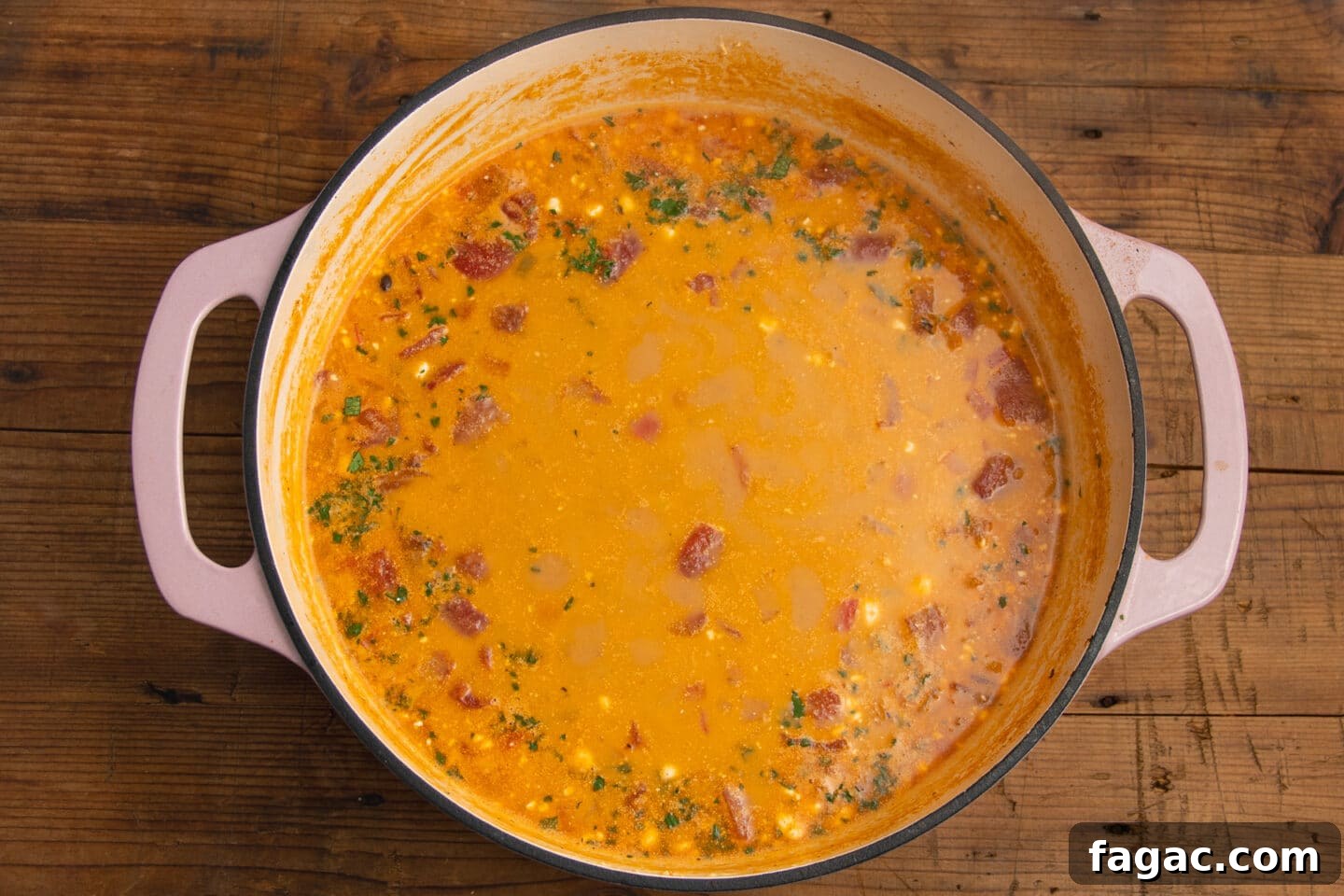 Creamy Beef Taco Soup Recipe with Cheesy Tortilla Toppings 9 This is a picture of the cream cheese and cheddar added and melted into the creamy beef taco soup.