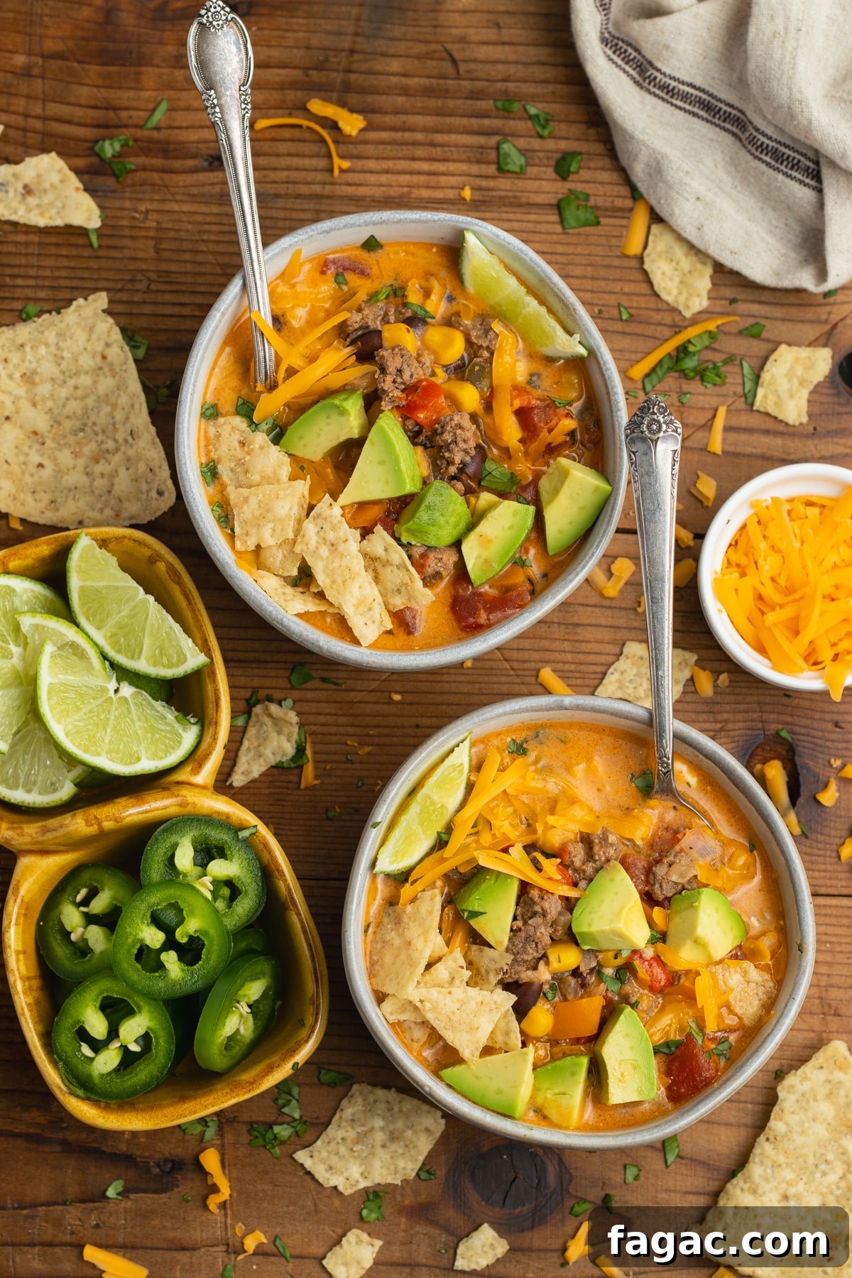 Creamy Beef Taco Soup Recipe with Cheesy Tortilla Toppings 10 This is a picture of two bowls filled of creamy beef taco soup.