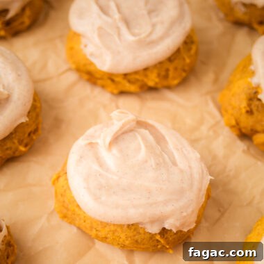Frosted Pumpkin Cookies Recipe with Cream Cheese Icing 5 tray of frosted pumpkin cookies