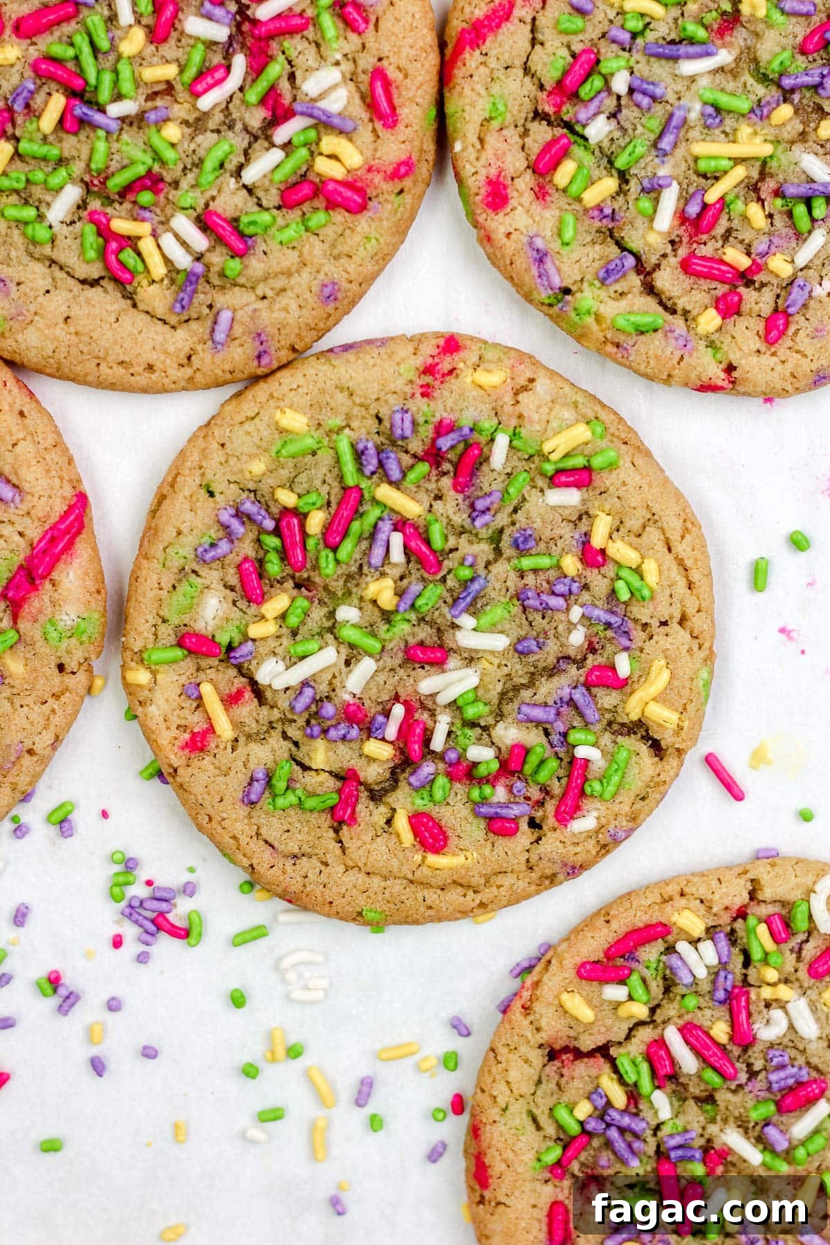 Sprinkle sugar cookies on a parchment paper lined baking sheet.