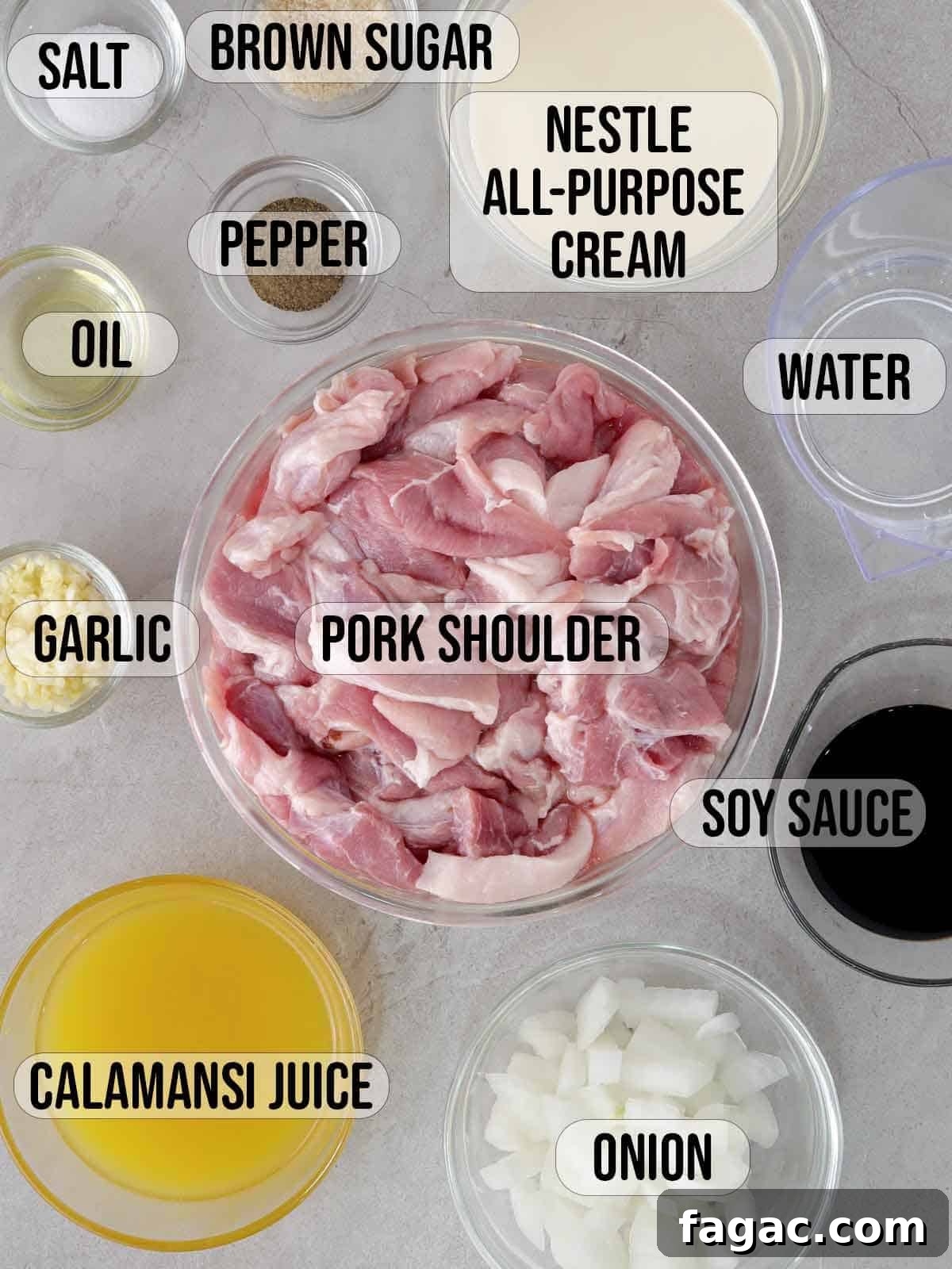 sliced pork, calamansi juice, Nestle all purpose cream, garlic, onions, soy sauce, water, salt, pepper, oil in bowls.