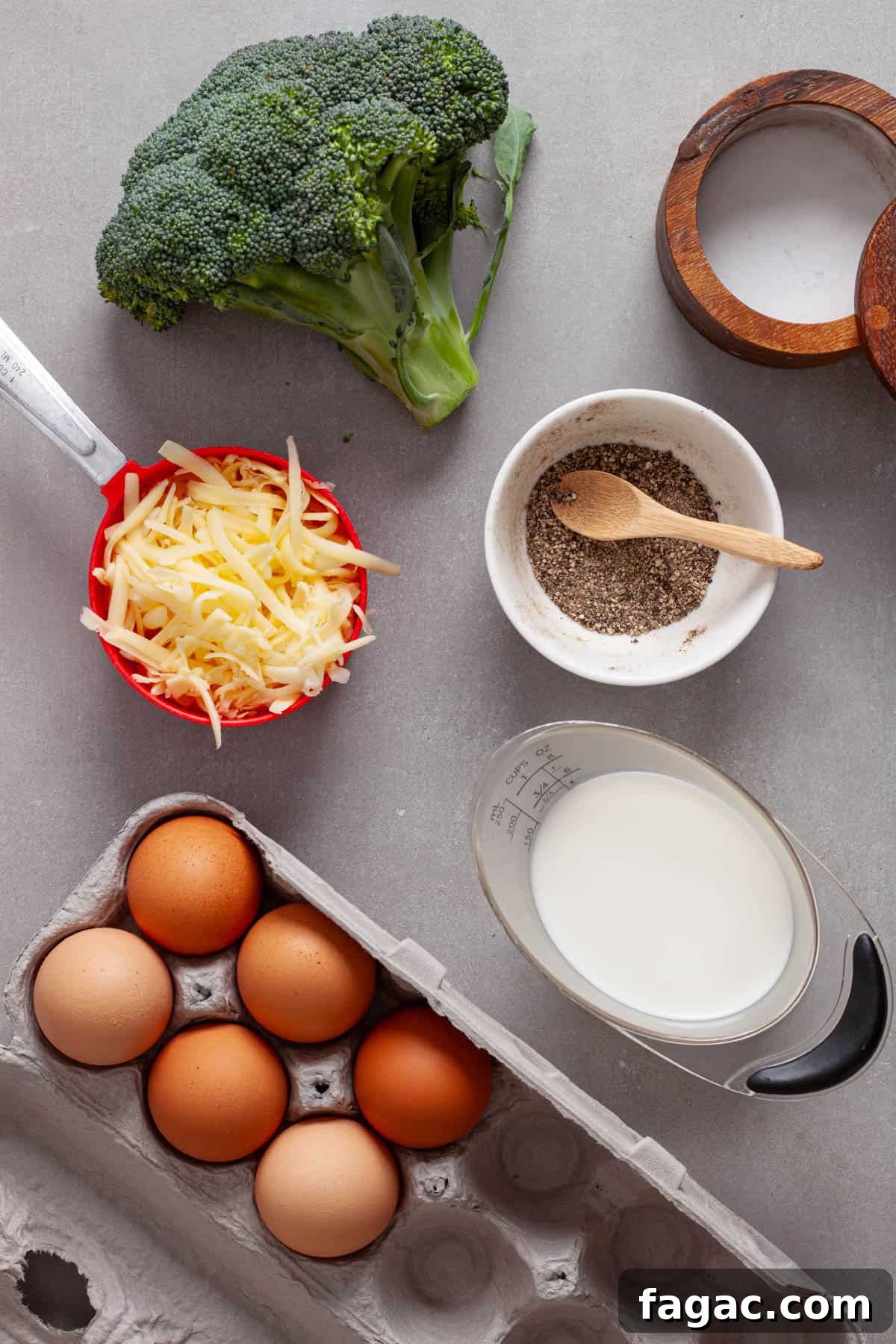 Broccoli Cheddar Mini Egg Bites: Protein-Packed Breakfast Bites 3 Ingredients for mini egg bites on a gray table.