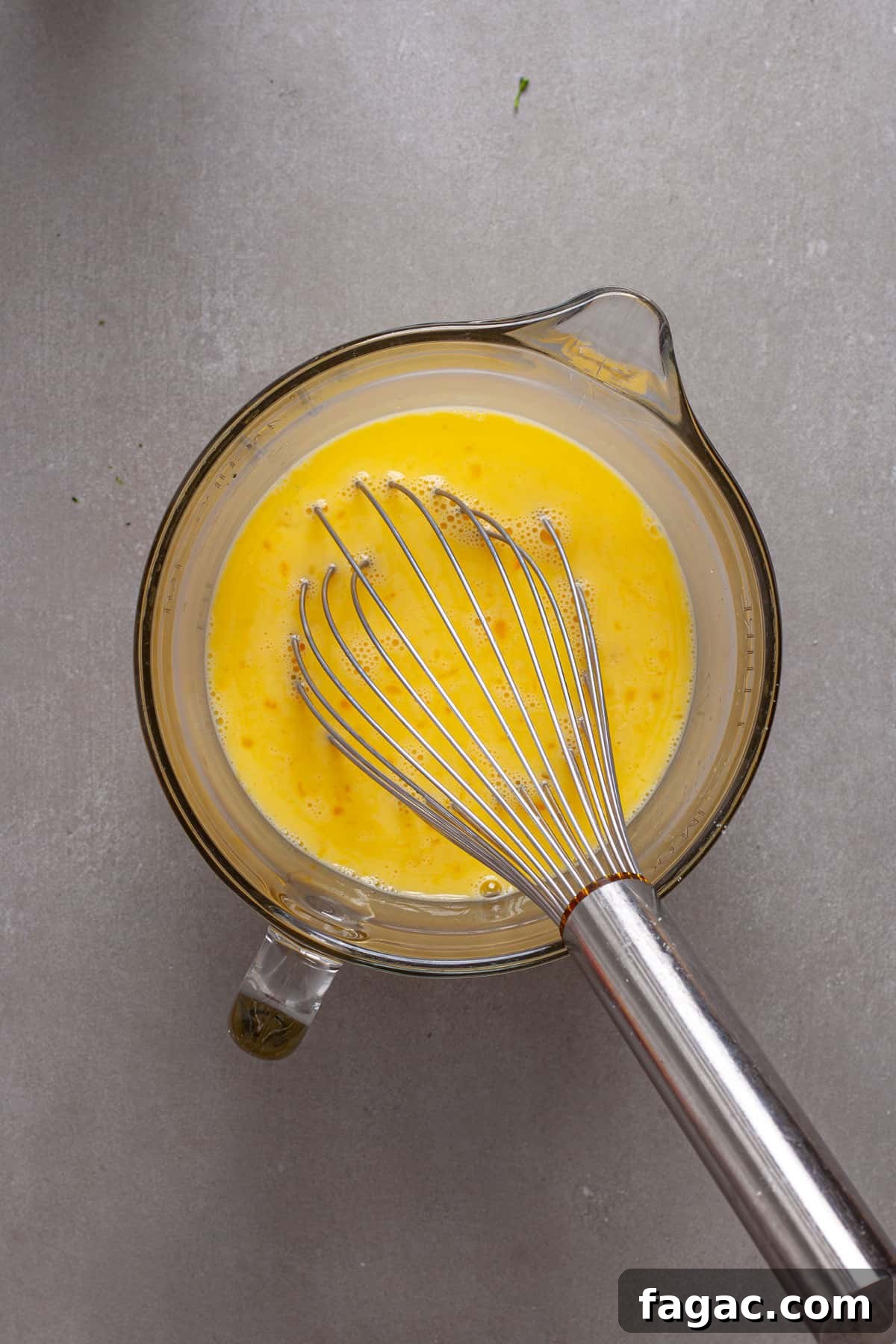 Broccoli Cheddar Mini Egg Bites: Protein-Packed Breakfast Bites 6 Egg s and milk whisked together in a large measuring cup.