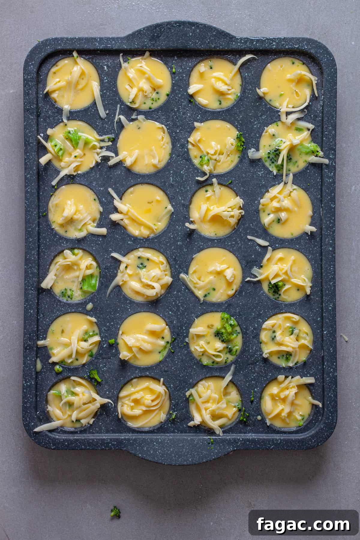 Broccoli Cheddar Mini Egg Bites: Protein-Packed Breakfast Bites 7 Mini egg bites getting assembled in a mini muffin pan.