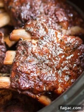 Cajun Slow Cooker Louisiana Ribs Recipe 8 close up of barbecue ribs in the slow cooker.