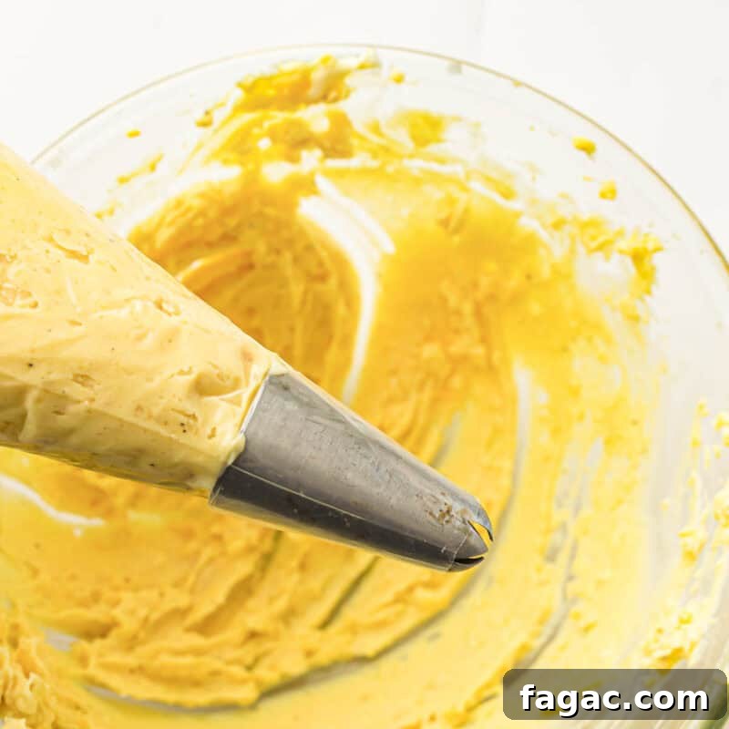Process step 4 - transfer filling to a piping bag or plastic bag with a snipped corner.