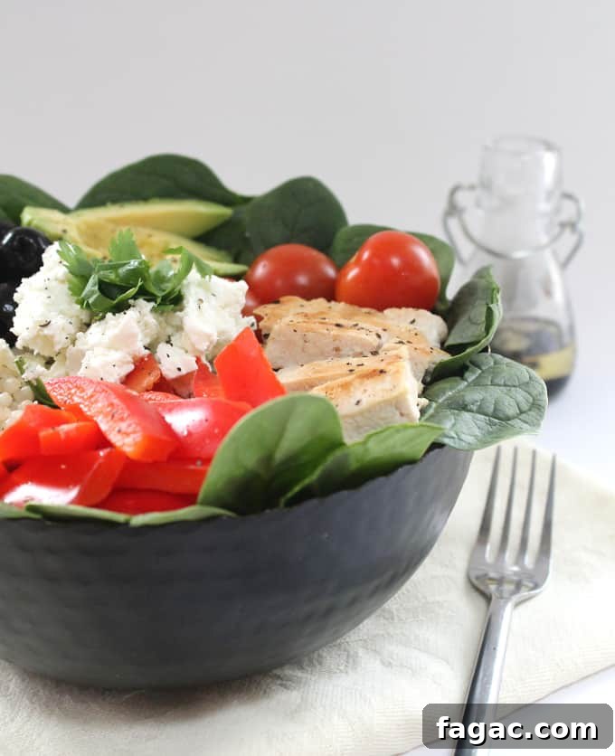 Quinoa Tabbouleh with Feta and Fresh Herbs 5 protein packed salad served in a black bowl