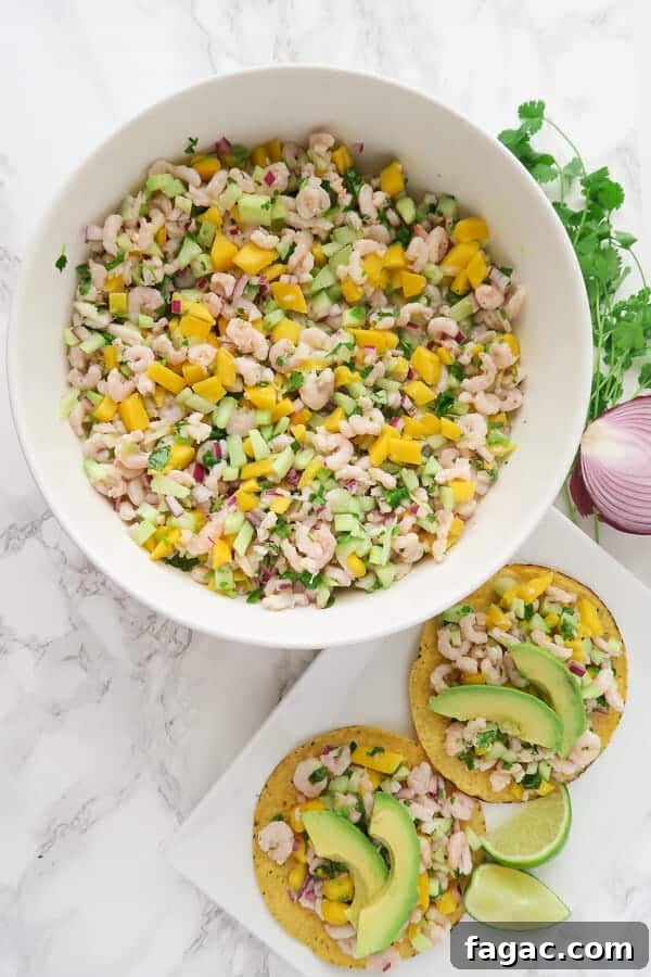 Shrimp Ceviche with Mango and Cucumber — Refreshing Summer Recipe 2 overhead shot of a large bowl of shrimp ceviche and a plate of tostadas topped with shrimp ceviche and avocados