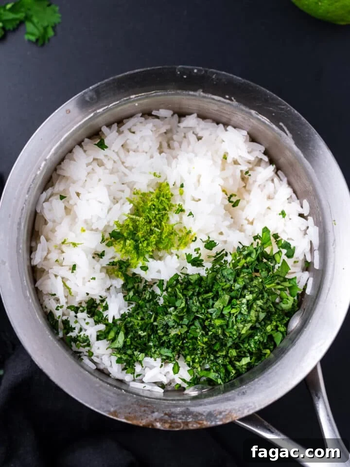 small saucepan with jasmine rice, lime zest and cilantro