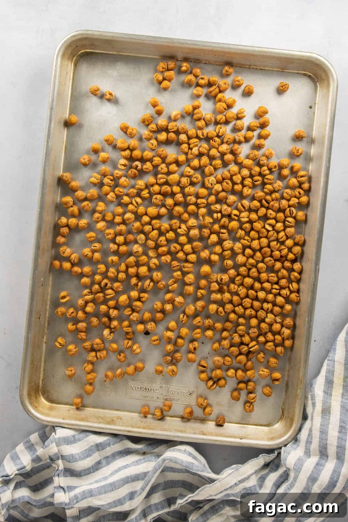 Crispy Roasted Chana (India’s Spiced Crunchy Chickpeas) 6 Roasted chana on baking sheet after removing from oven