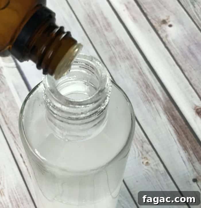 Streak-Free Homemade Glass Cleaner for Windows & Mirrors 8 Add essential oil