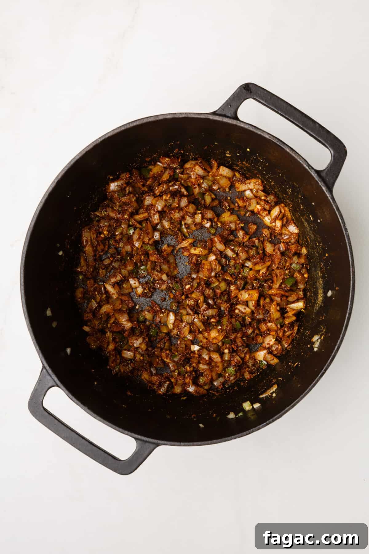Authentic Texas Chili Recipe: Classic Beef and Spice Guide 9 dutch oven with sauteed onion, garlic and jalapenos