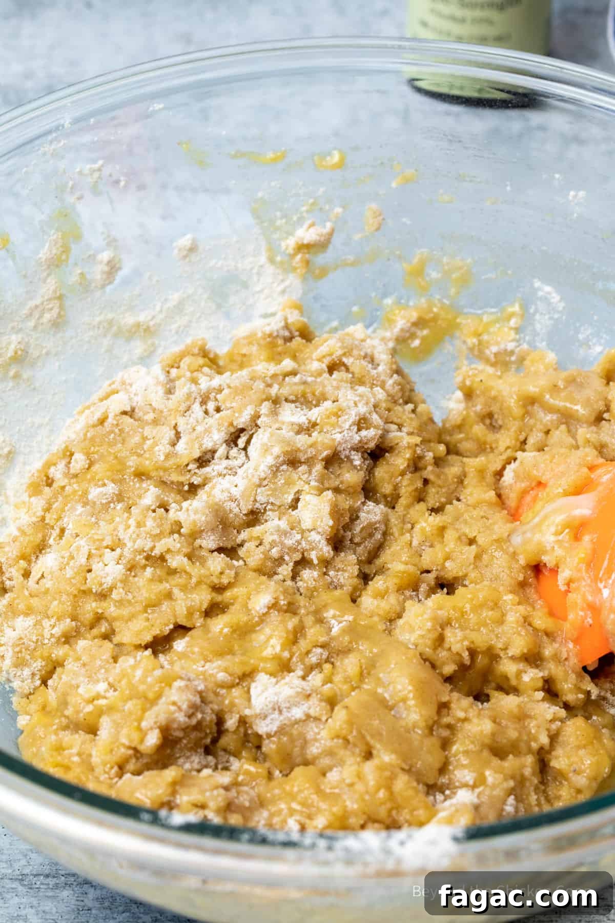 Moist Carrot Cake Recipe with Cream Cheese Frosting 6 Cake batter in a glass bowl.
